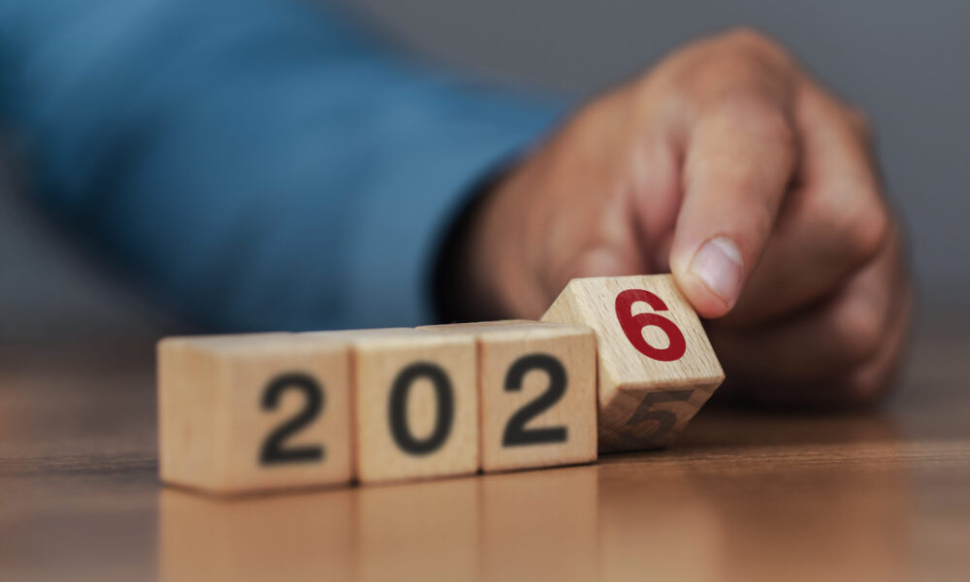 SME management team planning business strategy and financial goals for 2026 with ERP software like NetSuite and Sage