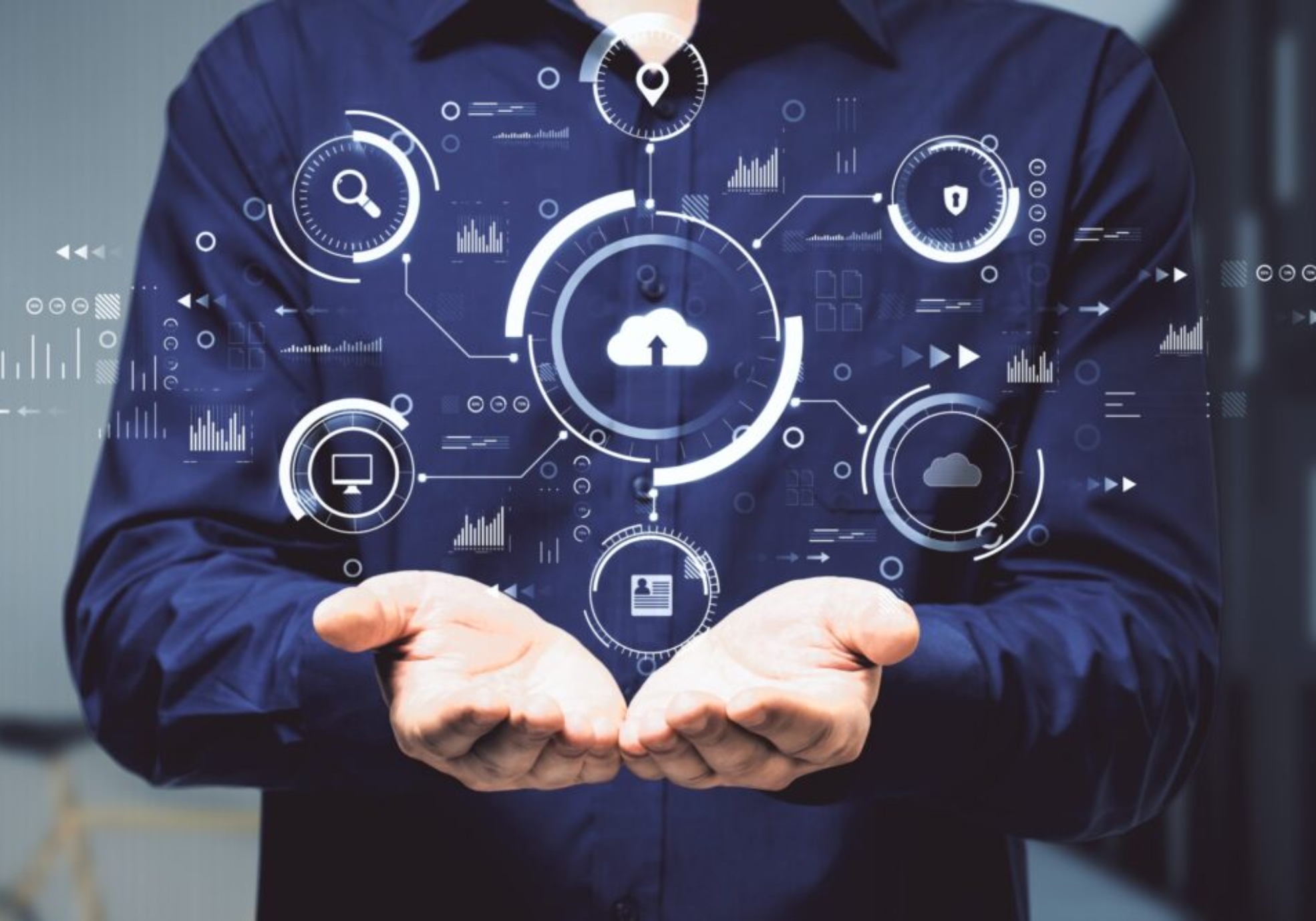 Hands holding abstract digital business interface representing cloud ERP and AI-driven insight for Irish organisations